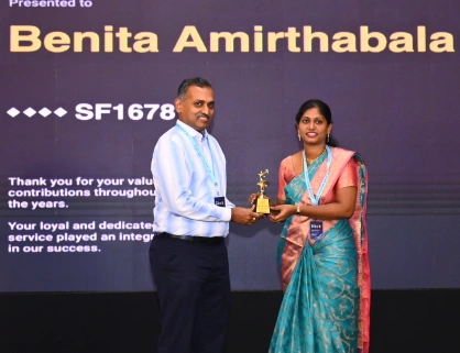 Benita receiving award from Davis