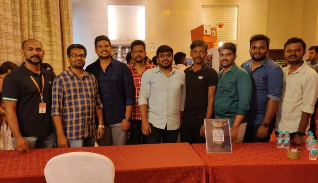 Senthilkumar Muthukumaraswamy with colleagues during an event