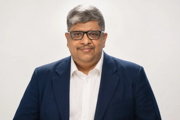 Anand srinivasan with black coat