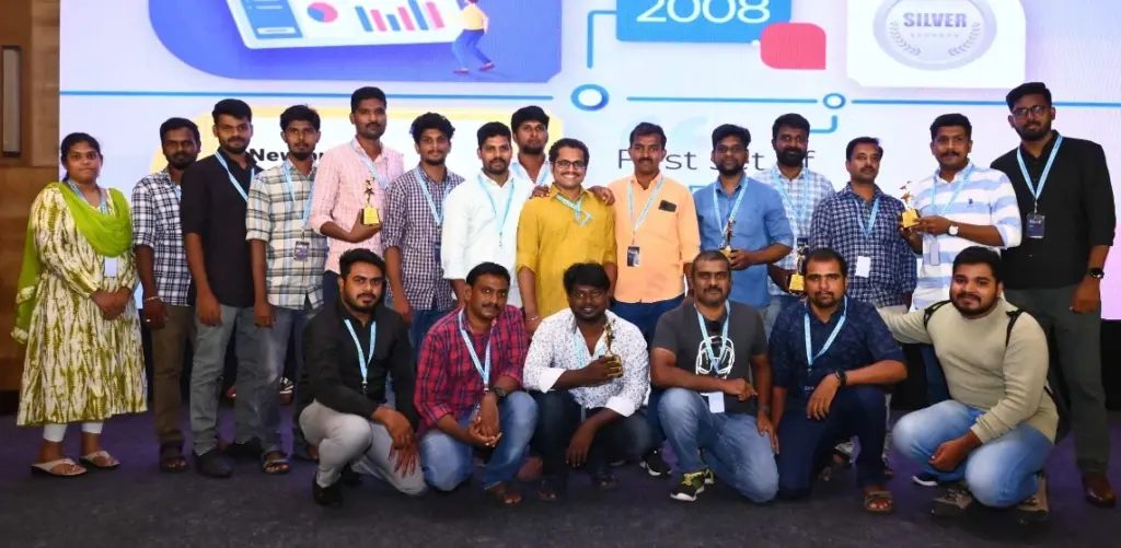 Anandakumar with his team members in next event
