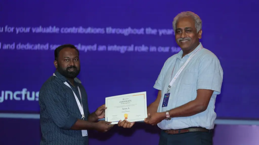 Arun Amuthakani Receiving an Award from Daniel Sir