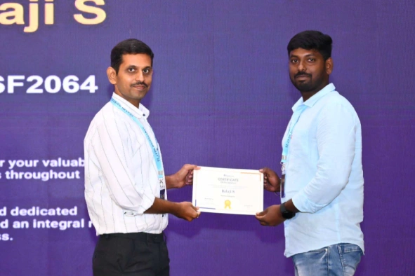 Balaji getting certificate from a manager