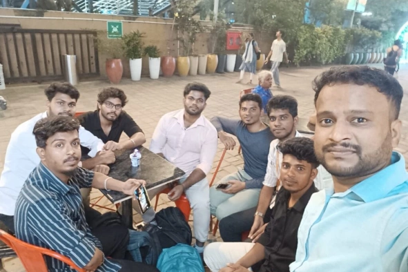 Baskaran Kumaravel with friends at gathering