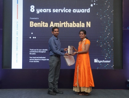 Benita getting eight year service award