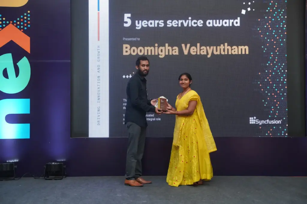 Boomigha Velayutham Receiving a fifth Year Service Award