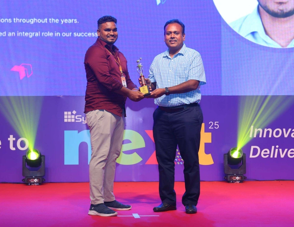 Buvanesh valarman receving award from stephen