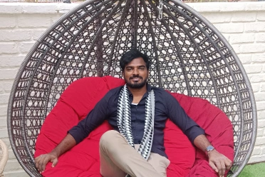 Deepak Gunasekaran relaxing on swing