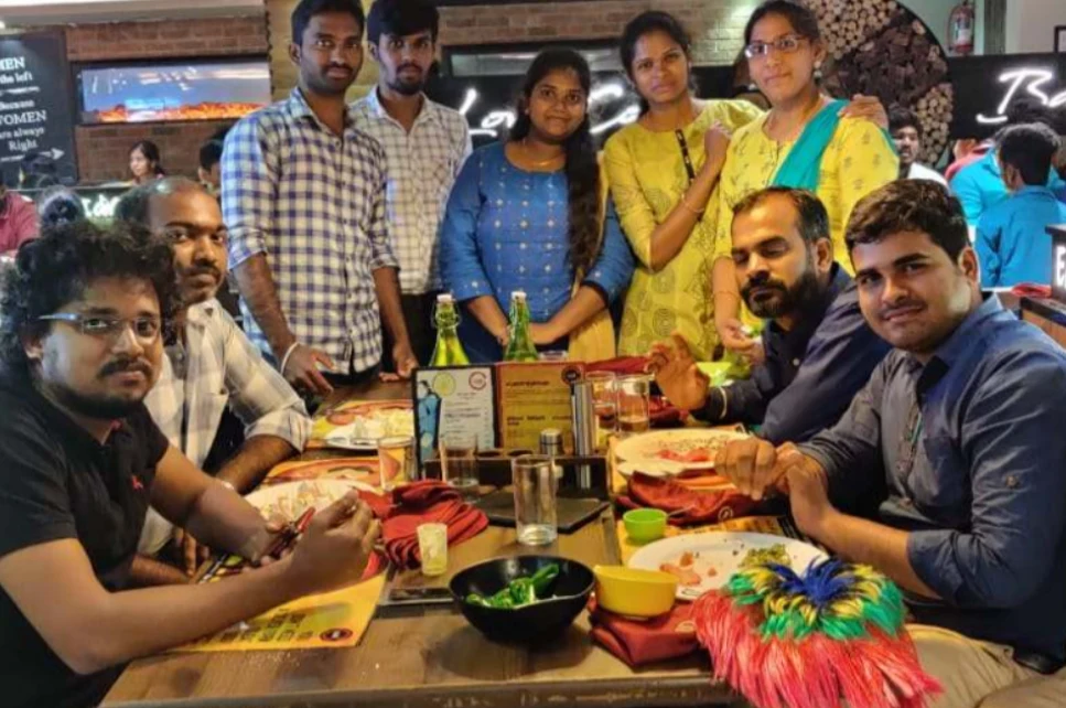 Gobalakrishnan with team members in team lunch