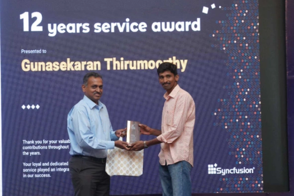 Gunasekaran T receiving a certificate in next
