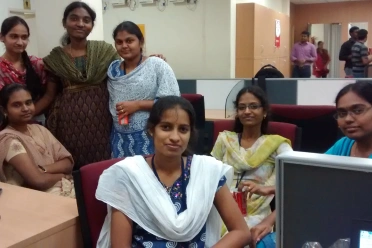 Jayaleshwari Nagarajan with colleagues at workspace