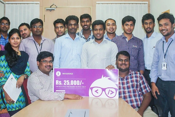 Jayaprakash Baskar with team receiving certificate