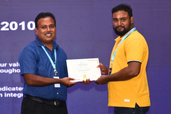 Jayaprakash kamaraj receving certificate from Stephan jebaraj