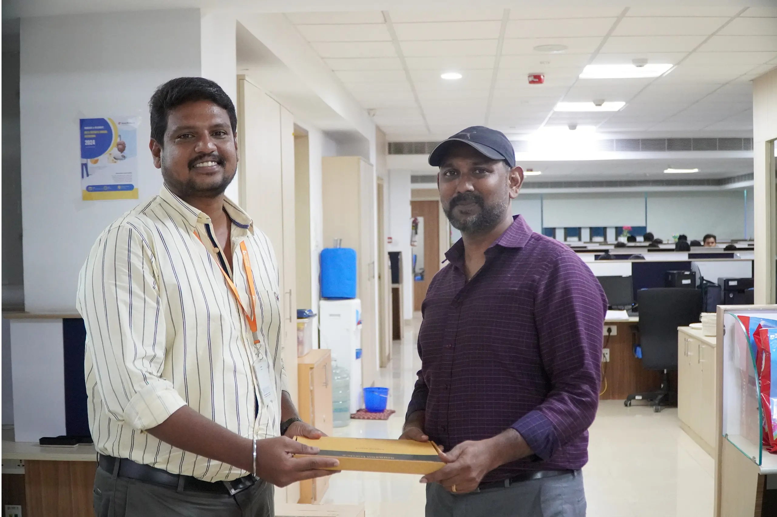 Jayavigneshwaran receving gift from George