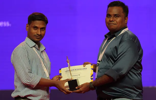 Jebaraj Manickam Receiving an Award