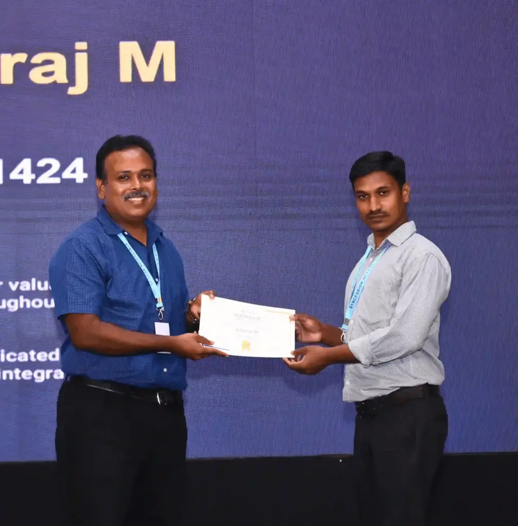 Jebaraj Manickam Receiving a Certificate