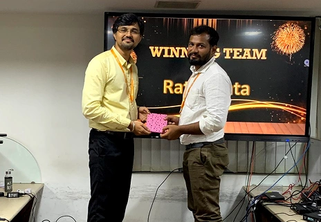 Jegan Raj getting gift from Baskaran Sethurajan