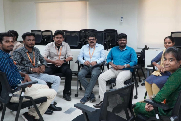 Johnson Manohar with team members in meetup