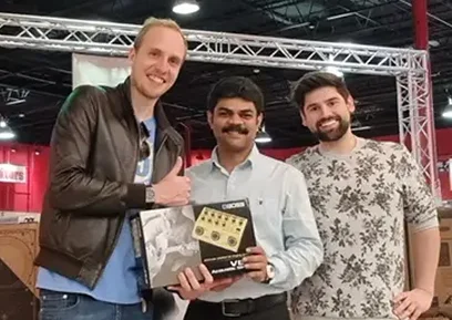 Johnson Monohar with team in a foreign event