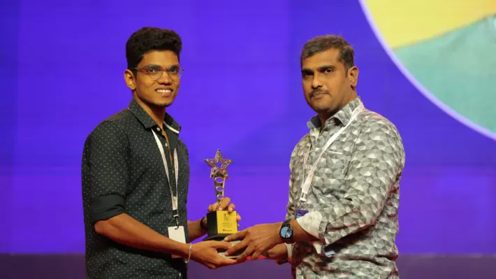 Karthik Raja Arumugam receiving recognition