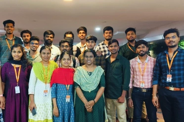 Karthik Raja Arumugam with office team members at gathering