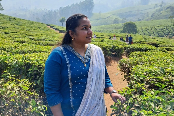 Keerthana in an greenary mountain