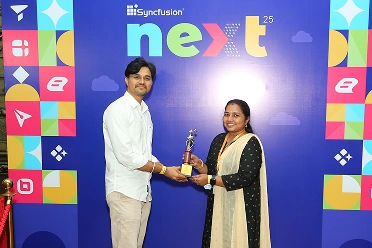 Keerthana receiving award from Baskaran in next event