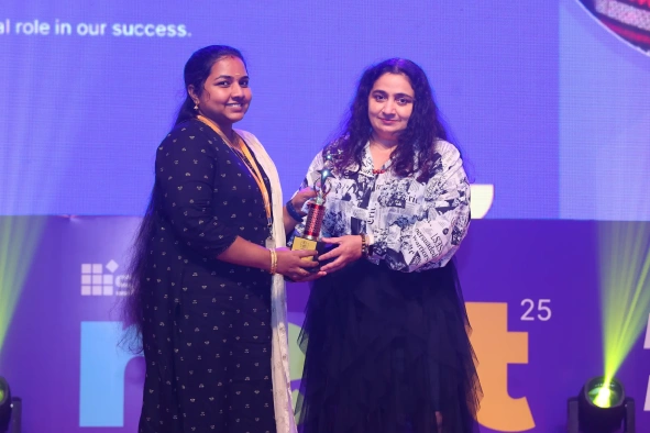 Keerthana receiving award from Srilatha