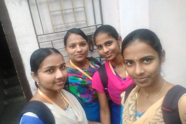 Keerthana with her friends with Syncfusion id card