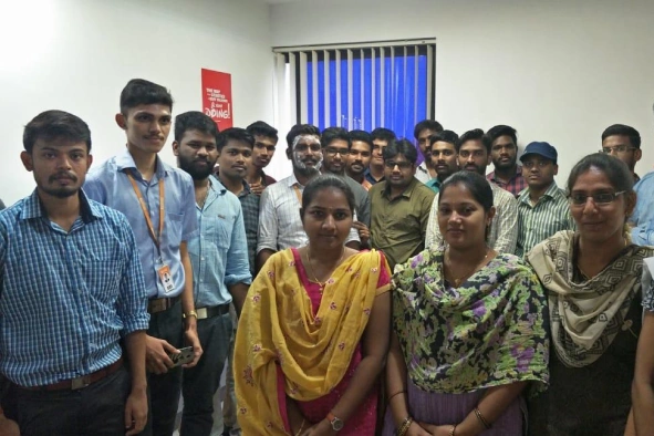 Keerthana with her team getting appreciation