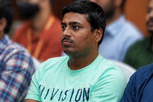 Kumar Kanagasabai sitting in chair