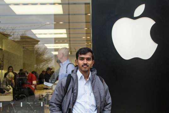 lingaraj standing in front of apple