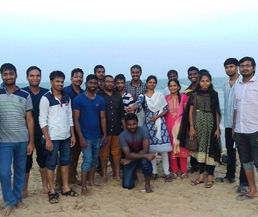 Manikandan Murugesan with team in beach