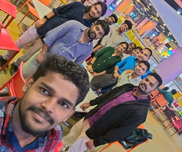 Manikandan Murugesan with team mates in mall court