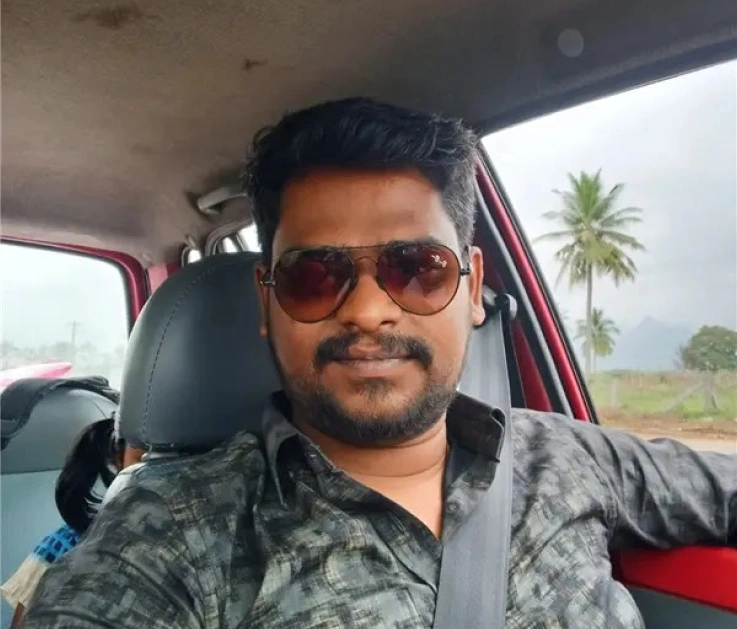 Manikandan Selvaraj driving car