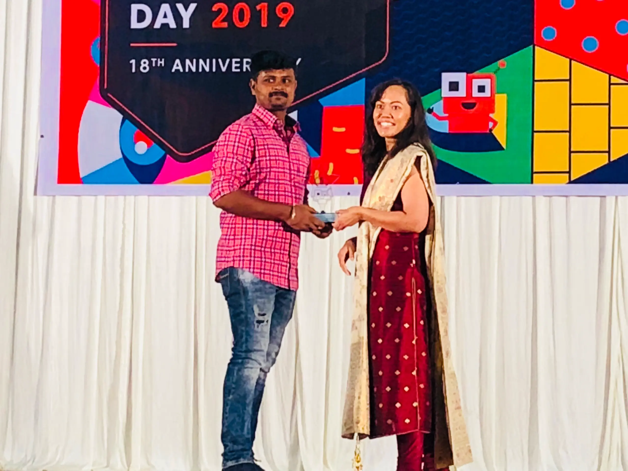 Manivannan Elangovan Receiving an Award at Event