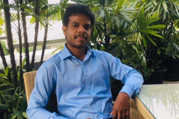 Martin Jebaraj sitting in the chair
