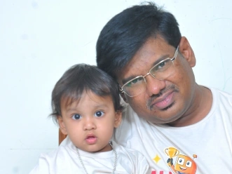 Mohamed Abdul with his child