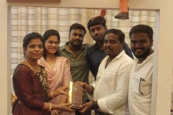 Mohammed Farook Jinnah Receiving Appreciation With Team