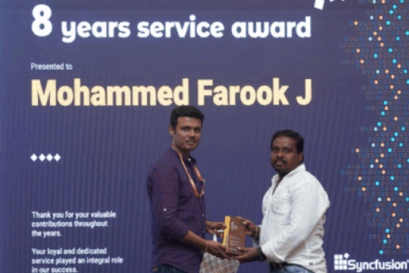 Mohammed Farook Jinnah Receiving Eight Years Service Award