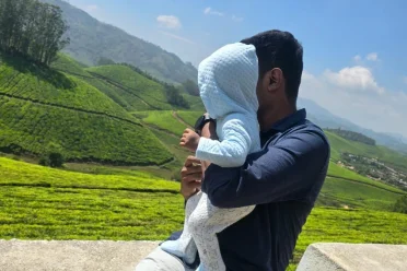 Mohammed Ismail with him baby in nature