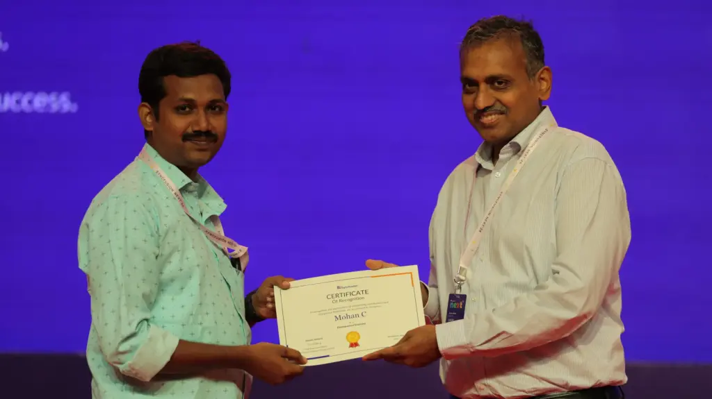 Mohan chandran receving certificate from davis