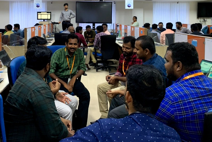 Mohan chandran with team in lead training