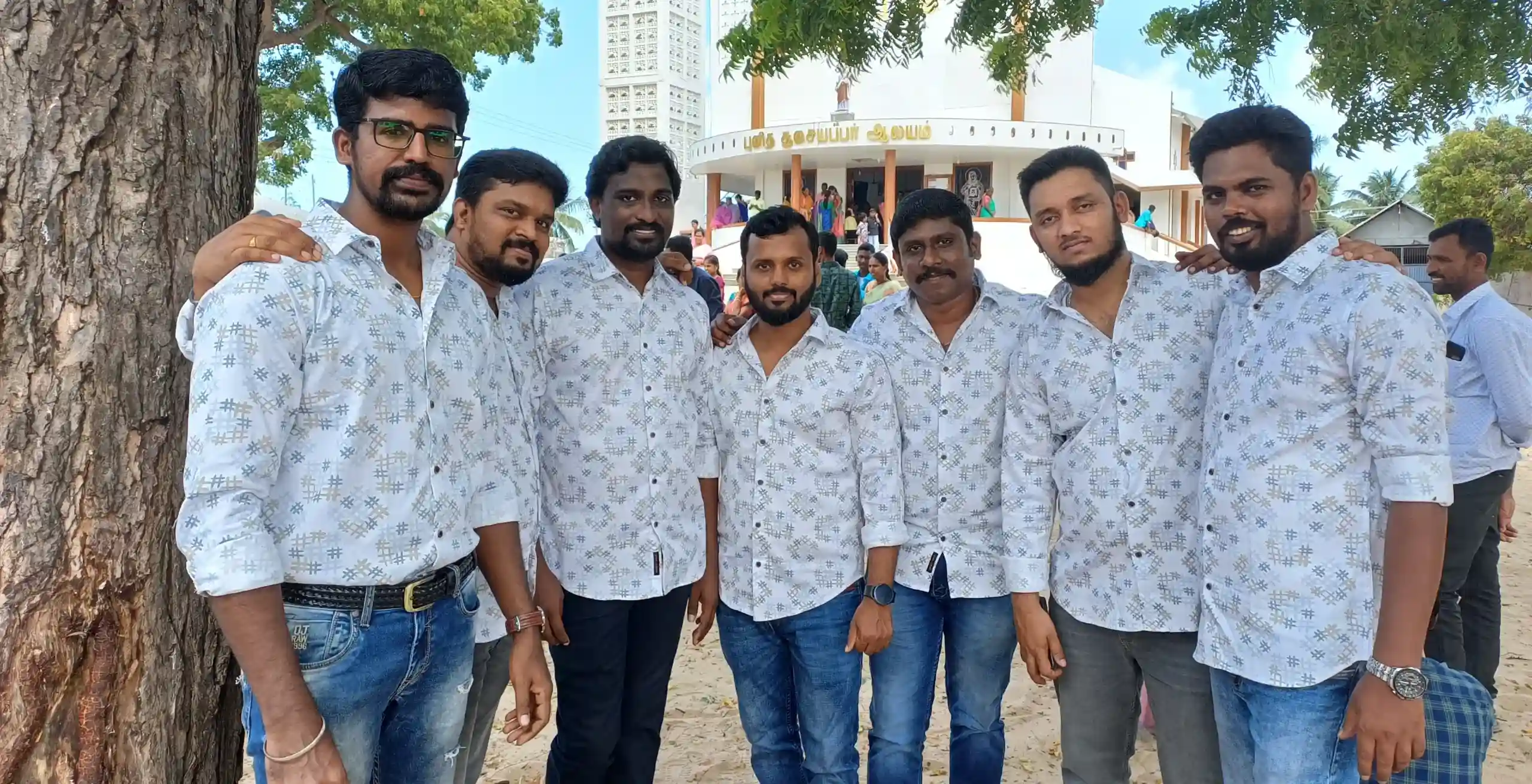 Muneesh kumar and friends with same shirts