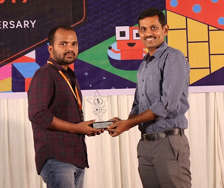 Narayanasamy receving five year service award
