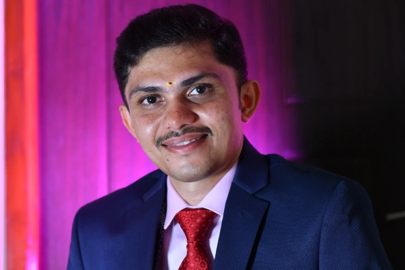 Navin Vinayagam with Pink Background
