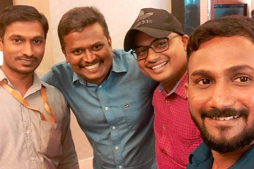 Nijamudeen Mohamed Sulaiman with four teammates