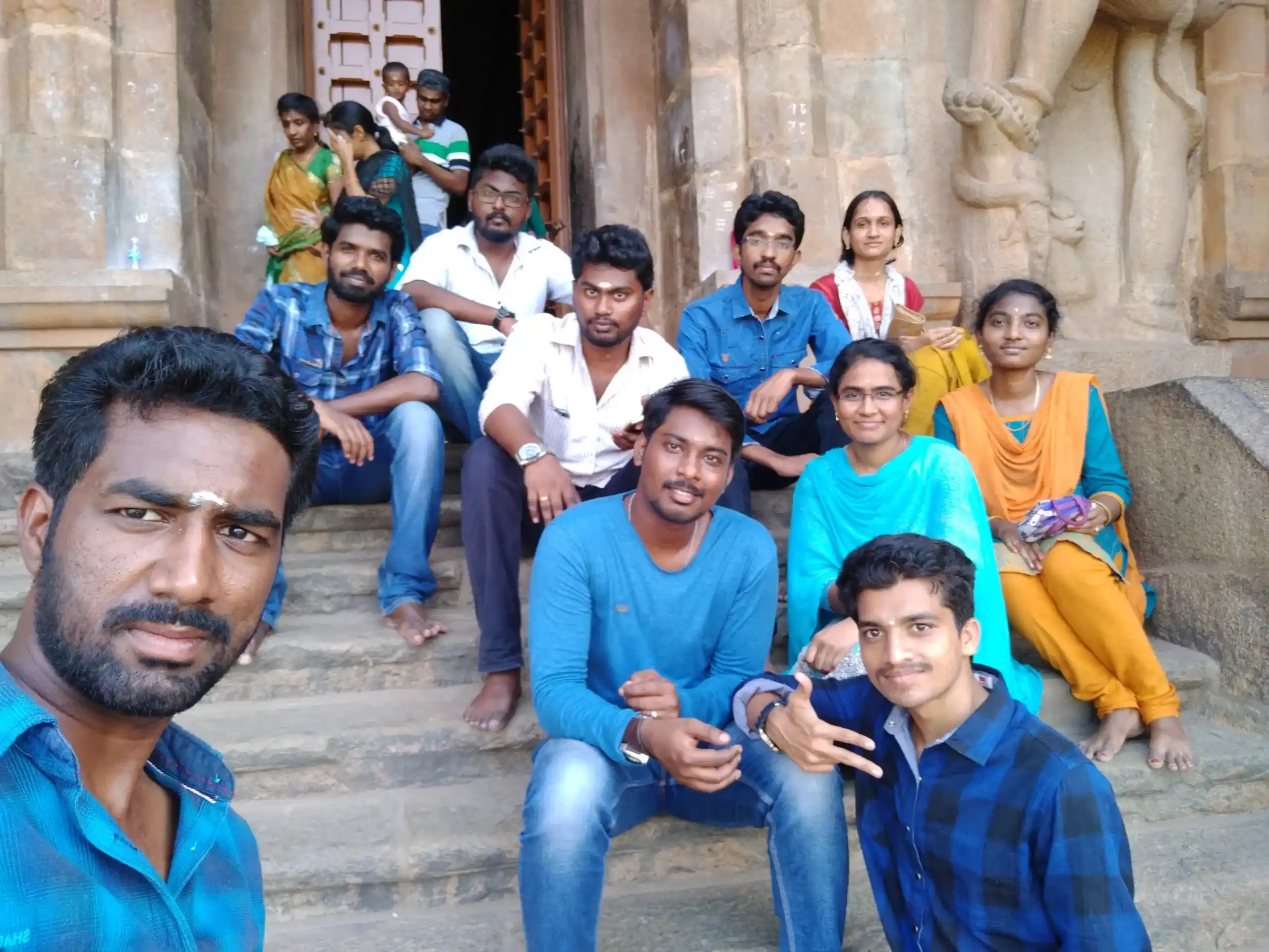 Piruthuviraj with his friends in a temple