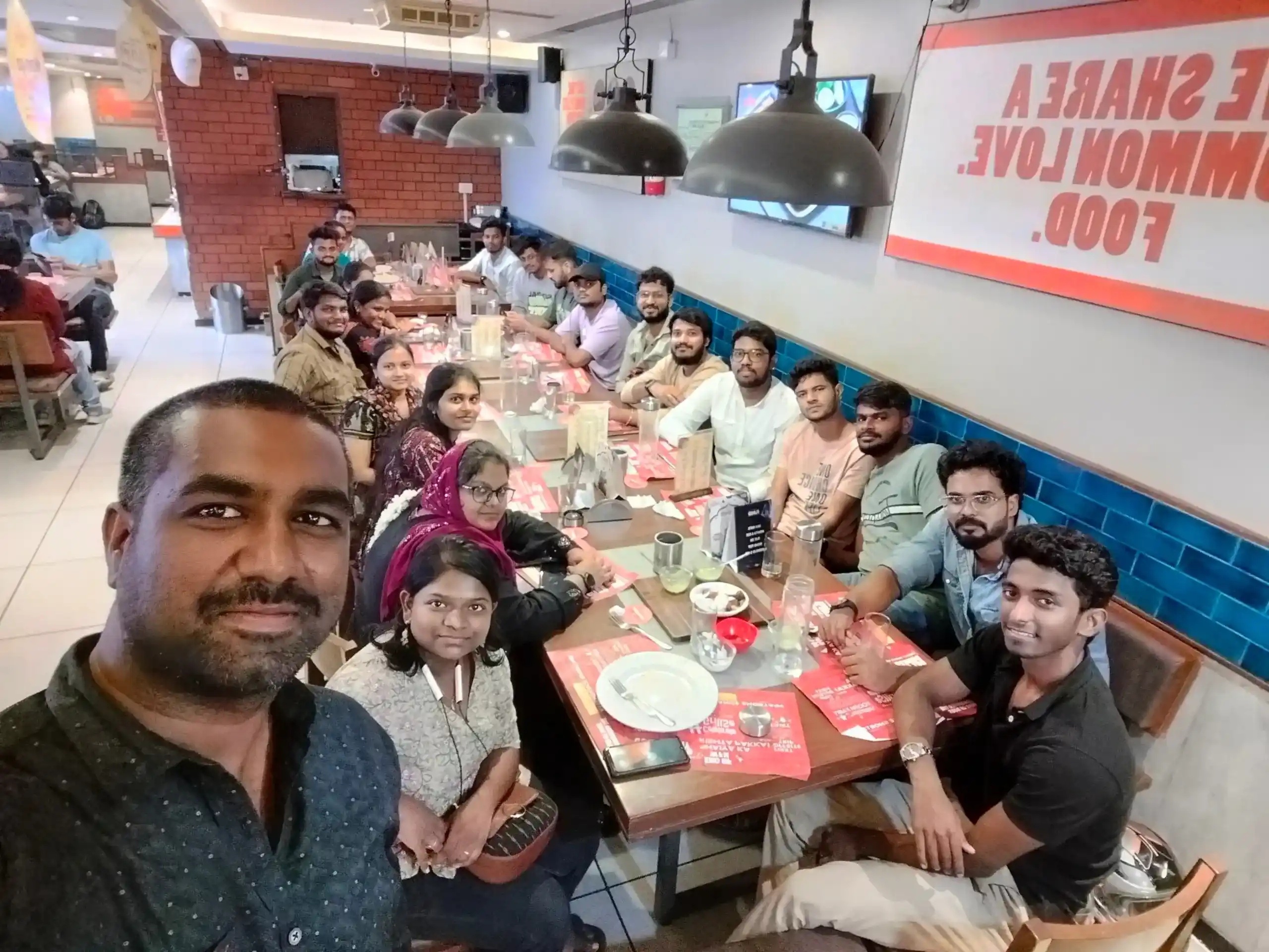 Piruthuviraj with his team members in team lunch