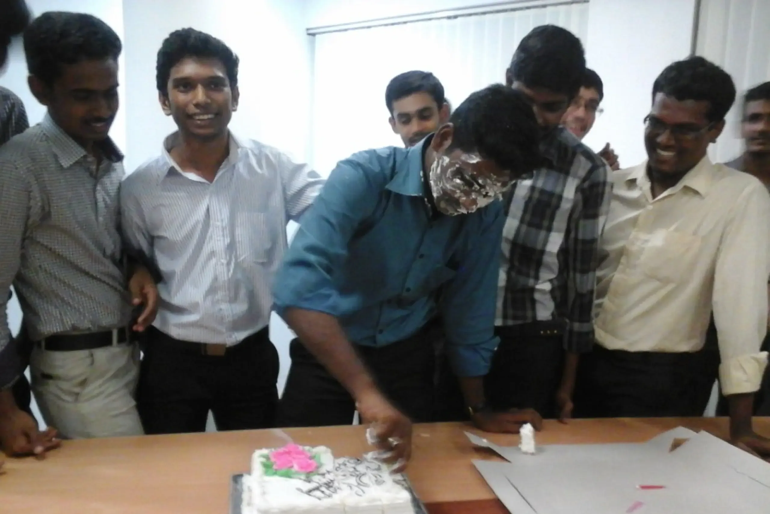 Prakash Perumal Celebrating a Birthday with Team Members