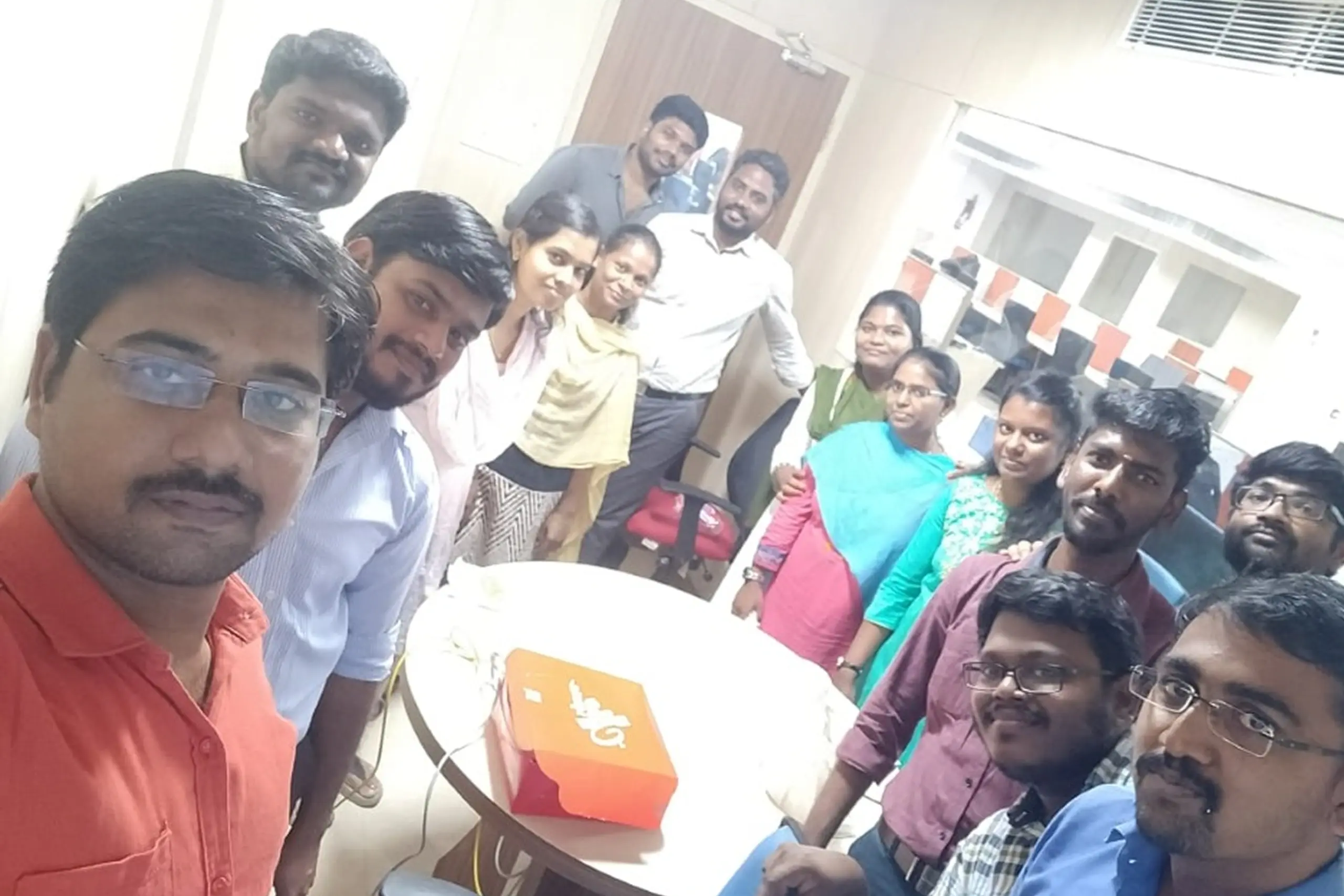 Prakash Perumal Taking a Selfie with Colleagues